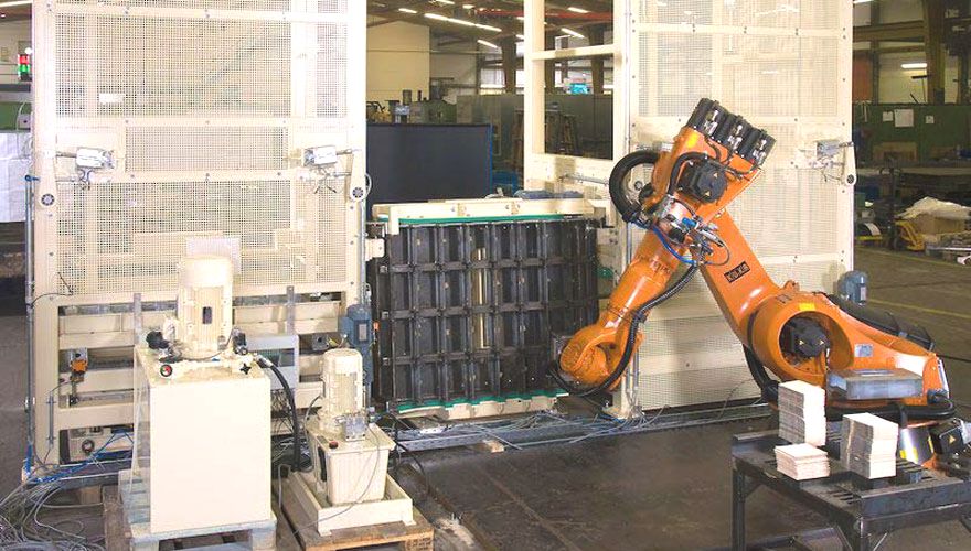 Robotic handling of the pasted lead plates: The loading of the pallets with the pasted plates is automated Patented process